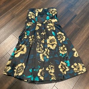 Black and gold floral with touch of turquoise Satin strapless cocktail dress.